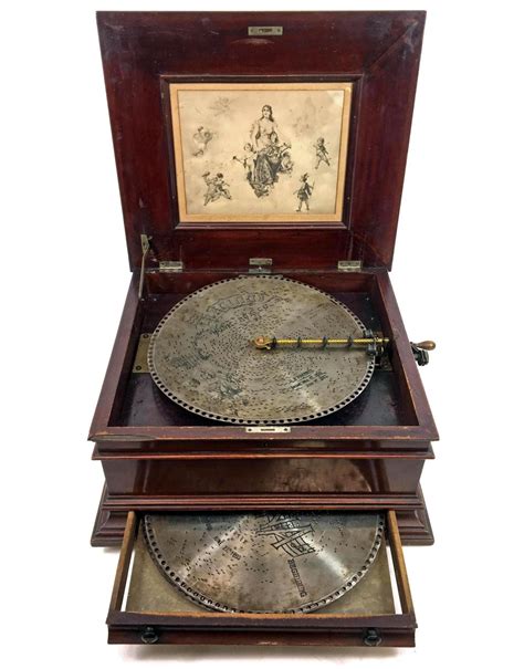 regina crank type music box with metal records|regina music box 1800s.